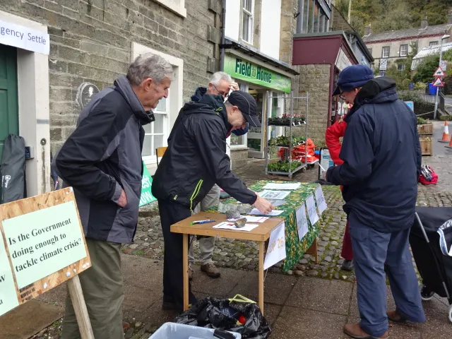 ACE members campaigning for the environment near Settle Market